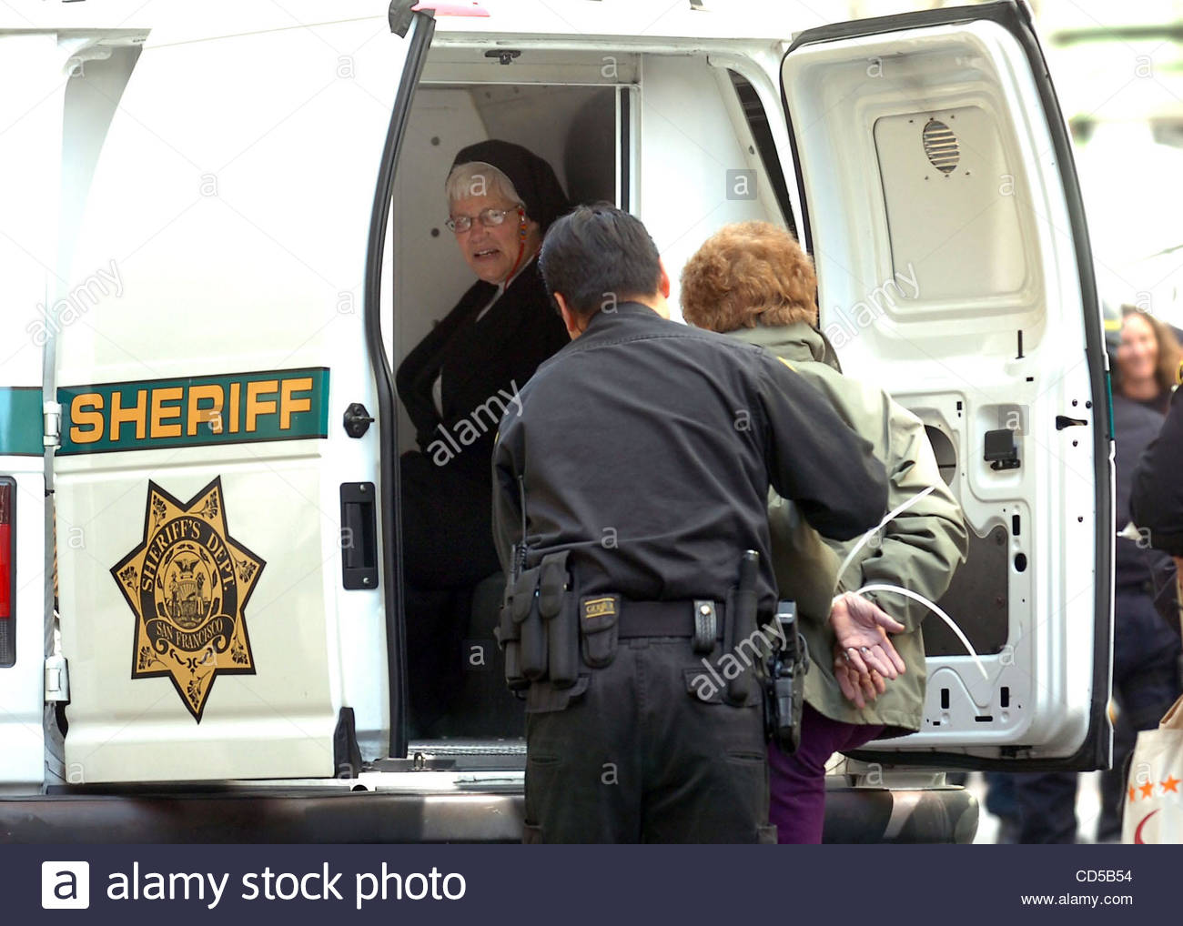 a-woman-in-nuns-clothes-waits-in-a-paddy-wagon-after-being-arrested-CD5B54.jpg