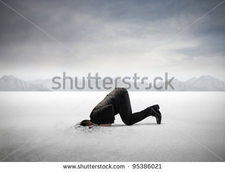 stock-photo-businessman-hiding-his-head-in-the-sand-95386021.jpg