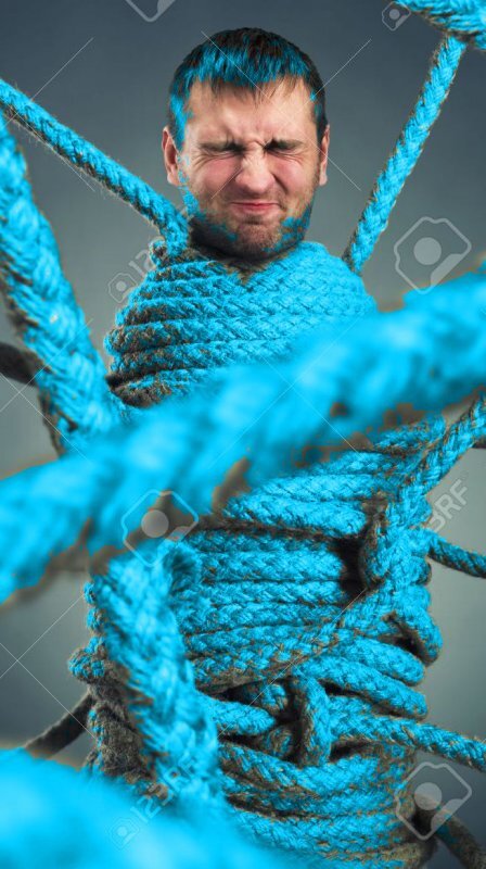 Businessman-trapped-in-rope-web-Stock-Photo-stuck-rope.jpg